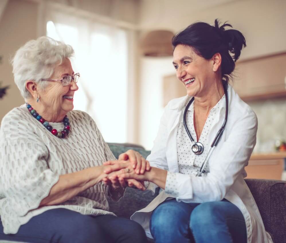 Compassionate-caregiver-checking-on-a-memory-care-resident-during-the-overnight-hours